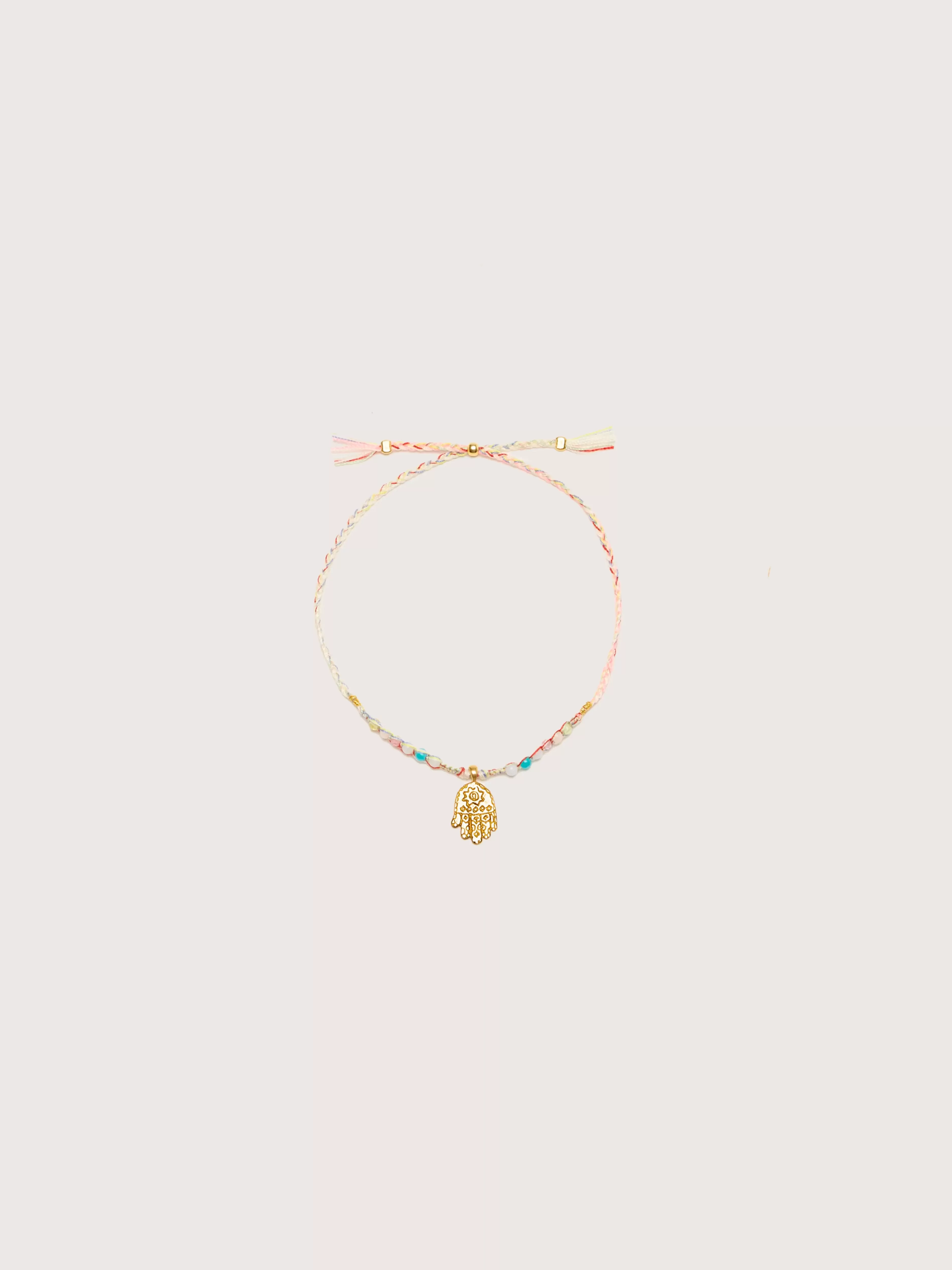 Bracelet Hamsa Protecteur - Bijou Roche Authentique, Élégance Intemporelle 

(Alternative option: Pendentif Hamsa Artisanal en Pierres Naturelles, Protection Symbolique & Style Unique)