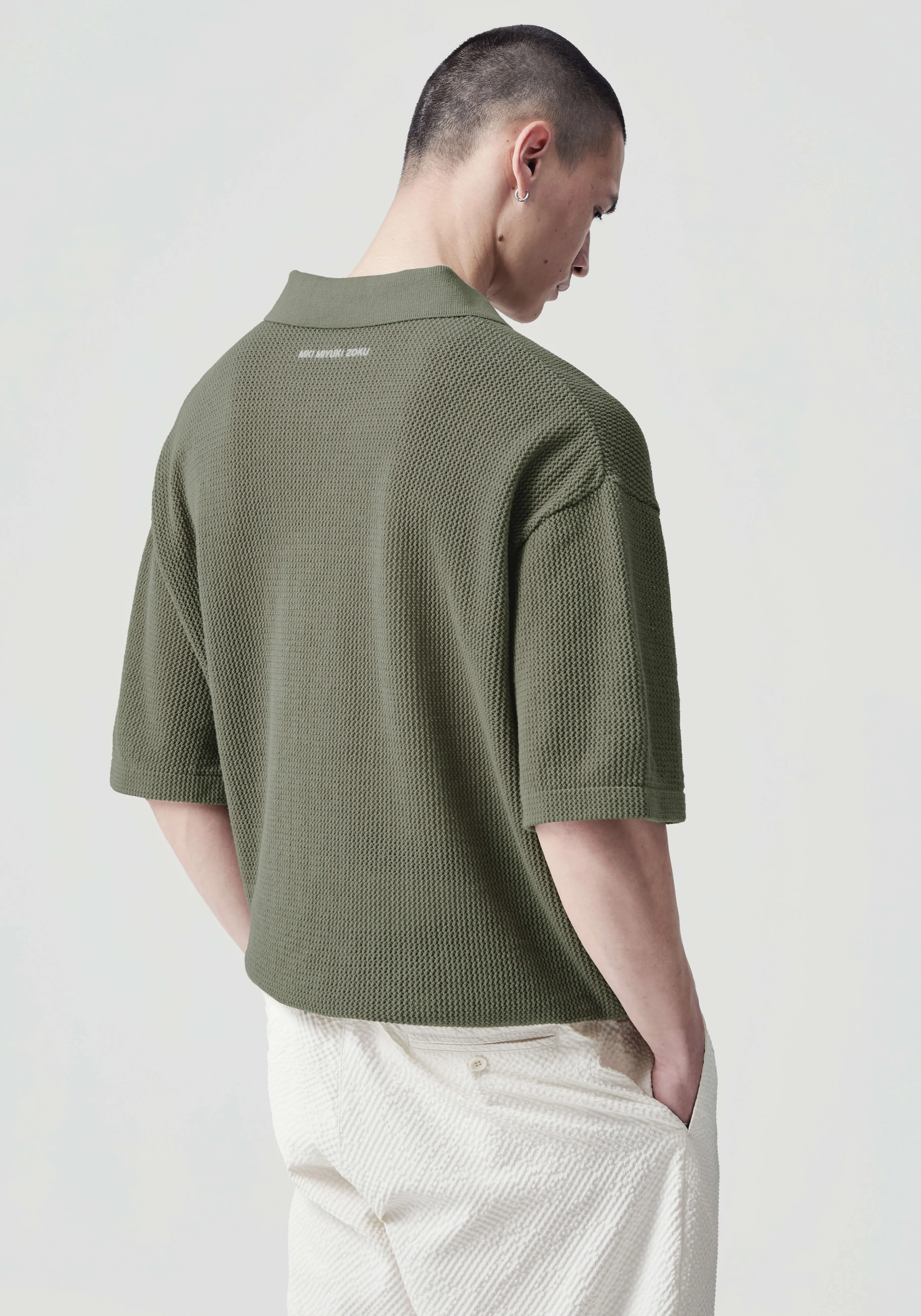 Polo Décontracté en Maille Aérée Miyuki Zoku - Collection Confort Urbain MKI 

Chemises Polo Respirantes en Point Lâche - Style Japonais Contemporain par MKI 

Polo en Maille Souple Miyuki Zoku - Coupe Relax MKI pour Look Urbain 

Collection Printemps MKI : Polos en Maille Aérée Style Zoku - Élégance Déstructurée 

Polo en Tissage Lâche MKI - Style Miyuki Zoku pour Mouvements Libres