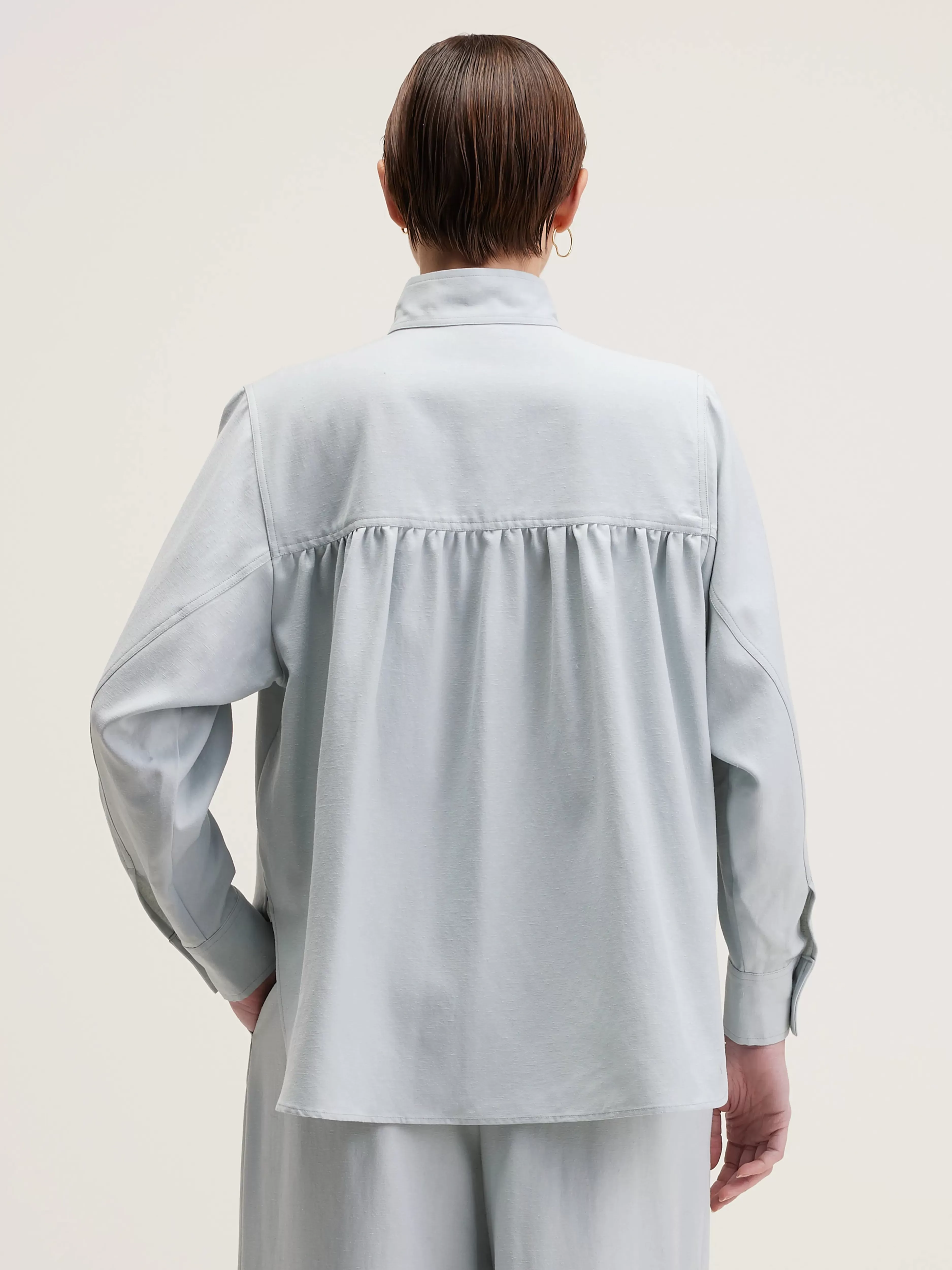 Blouse Bellerose en tonalité pêche avec fermeture boutonnée - Pièce incontournable de la collection printanière